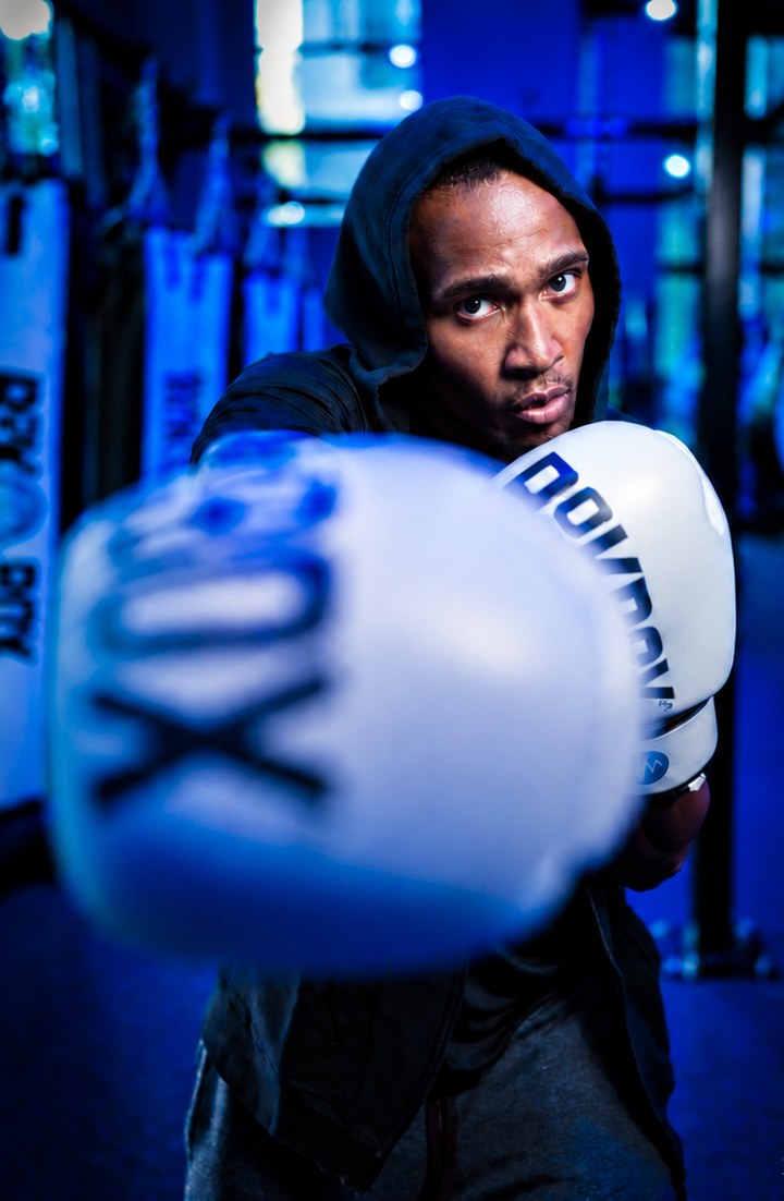 Rockbox member throwing a punch toward the camera